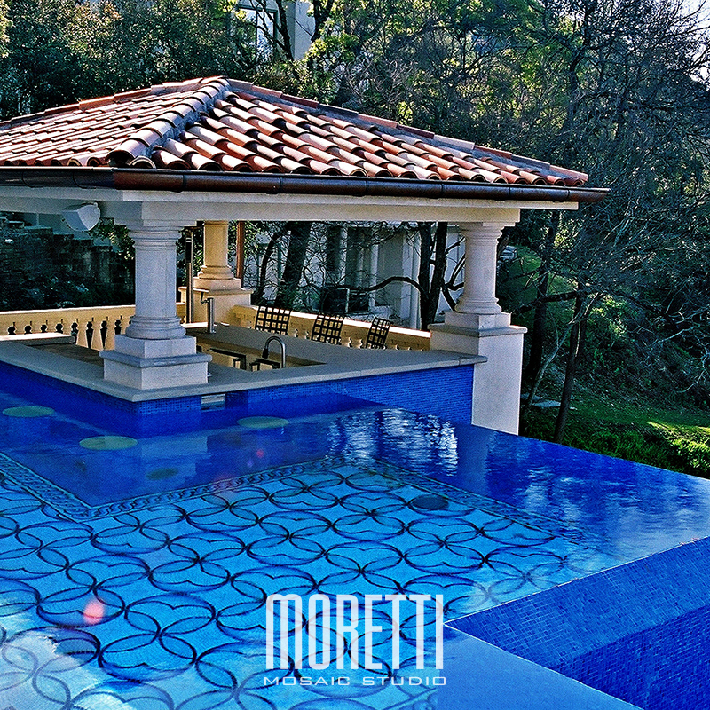 All glass tile pool with custom hand made design.